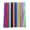 Tolv färgglada markeringshalsband med kardborre för valpar i nyanser av grönt, rosa, beige, gult, blått, orange och rött.