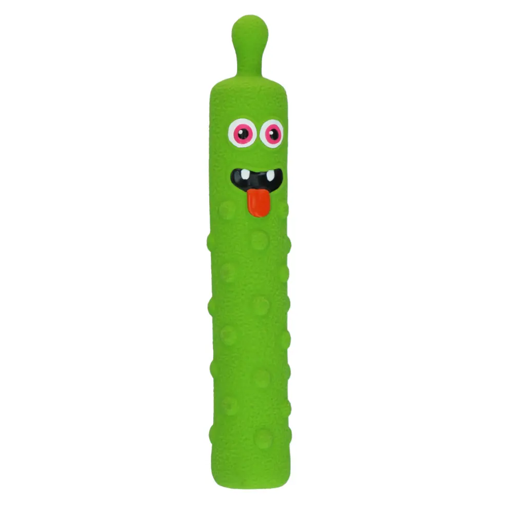 En rolig grön hundleksak i latex från Dog Comets, formad som ett knasigt litet monster med horn och ett stort öga.